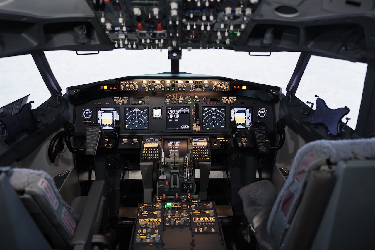 Empty airplane cockpit with electronic navigation panel Globalfleet
